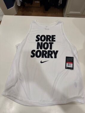 Nike White Tank with Bold Black "SORE NOT SORRY" Print